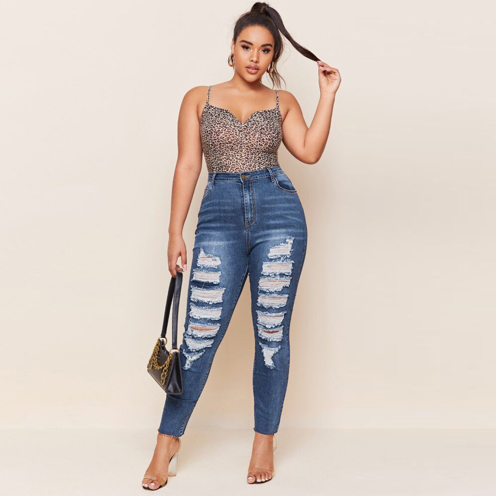 plus size ripped stretch ,whole cy ripped jeans,chic stretch jeans ,plus size ripped jeans , plus size stretch ripped, chic jeans ,slim plus size whole cut stretchy ripped jeans