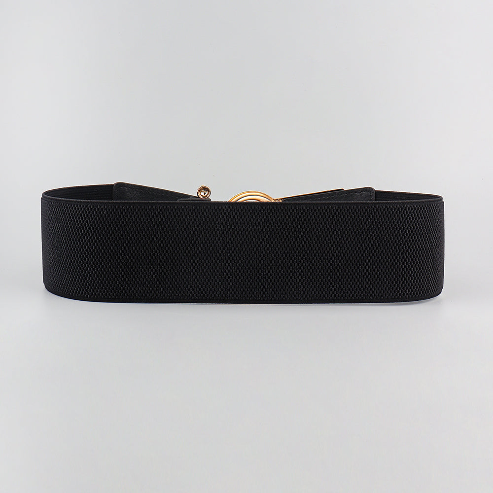La nueva faja en otoño e invierno está decorada con un abrigo de falda y un botón de metal negro.