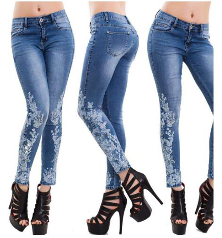 High-waisted embroidered jeans